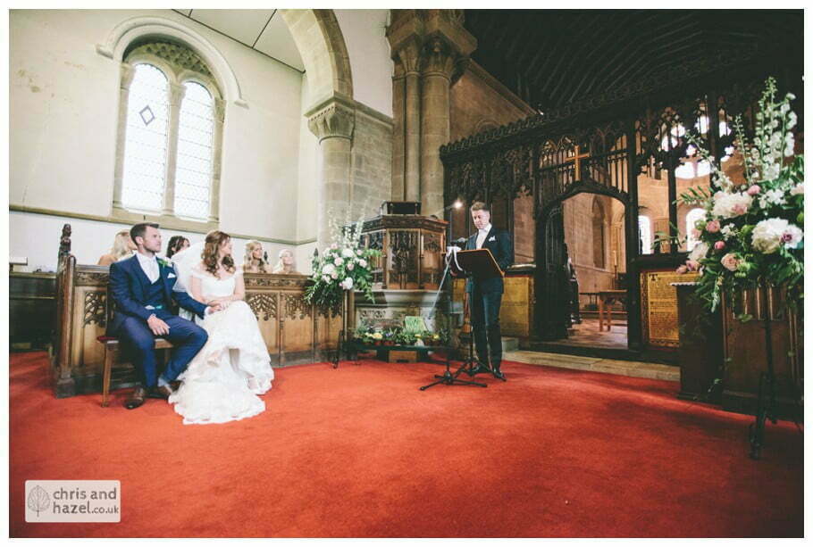bride and groom at front of church altar ceremony Whitly Church wedding Dewsbury Wedding Photographer Whitly Chris and Hazel Wedding Photography Steven Mountford Rachel Moore