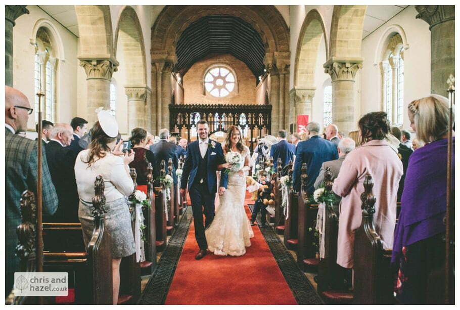 bride and groom walking down aisle ceremony Whitly Church wedding Dewsbury Wedding Photographer Whitly Chris and Hazel Wedding Photography Steven Mountford Rachel Moore