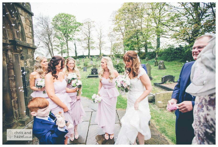 bride and bridesmaids outside Whitly Church wedding Dewsbury Wedding Photographer Whitly Chris and Hazel Wedding Photography Steven Mountford Rachel Moore