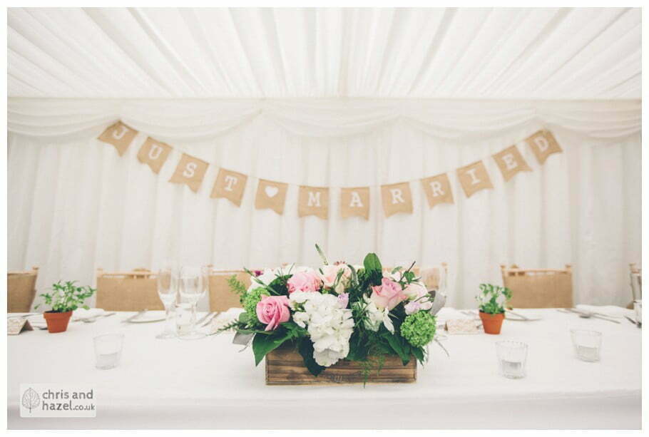 top table flowers rustic hessian country vintage elegant wedding theme chair covers documentary wedding photography reception Woodlands hotel Wedding Photographer leeds wedding photography Chris and Hazel Wedding Photography Steven Mountford Rachel Moore