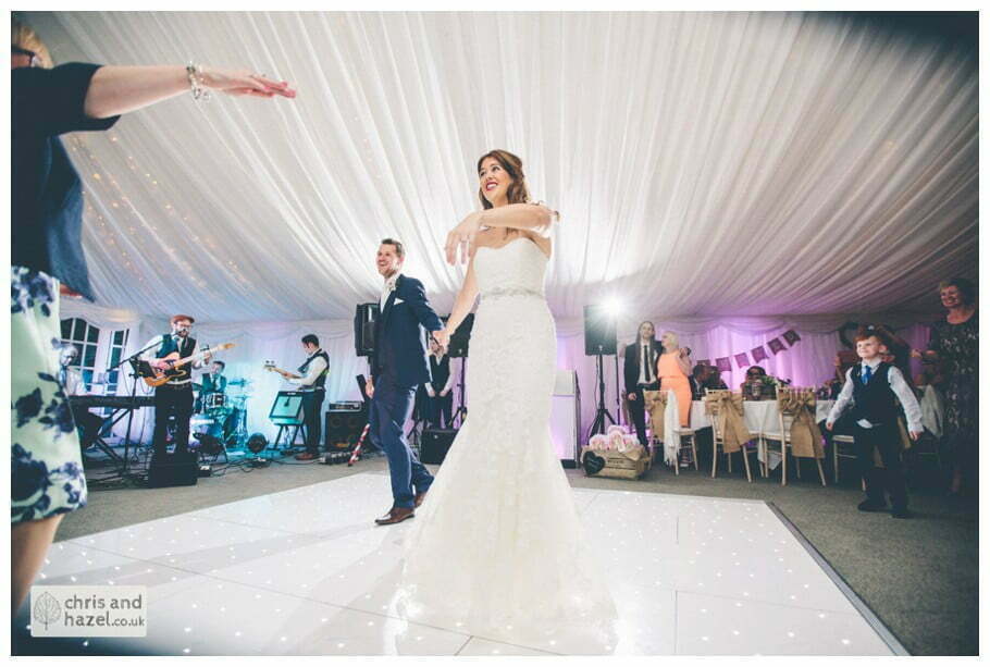bride and groom first dance wedding reception documentary wedding photography Woodlands hotel Wedding Photographer leeds wedding photography Chris and Hazel Wedding Photography Steven Mountford Rachel Moore