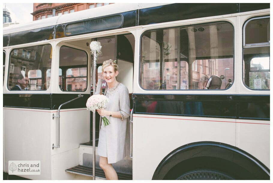 Bride vintage wedding bus single decker Leeds town hall wedding photography leeds town hall steps robin young clare robertson wedding