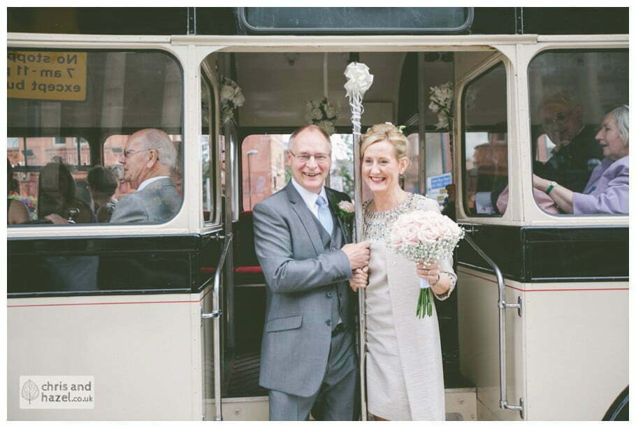 Single decker vintage wedding bus bride groom Leeds town hall wedding photography leeds town hall steps robin young clare robertson wedding