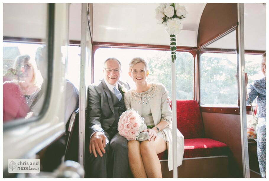 Single decker vintage wedding bus bride groom Leeds town hall wedding photography leeds town hall steps robin young clare robertson wedding