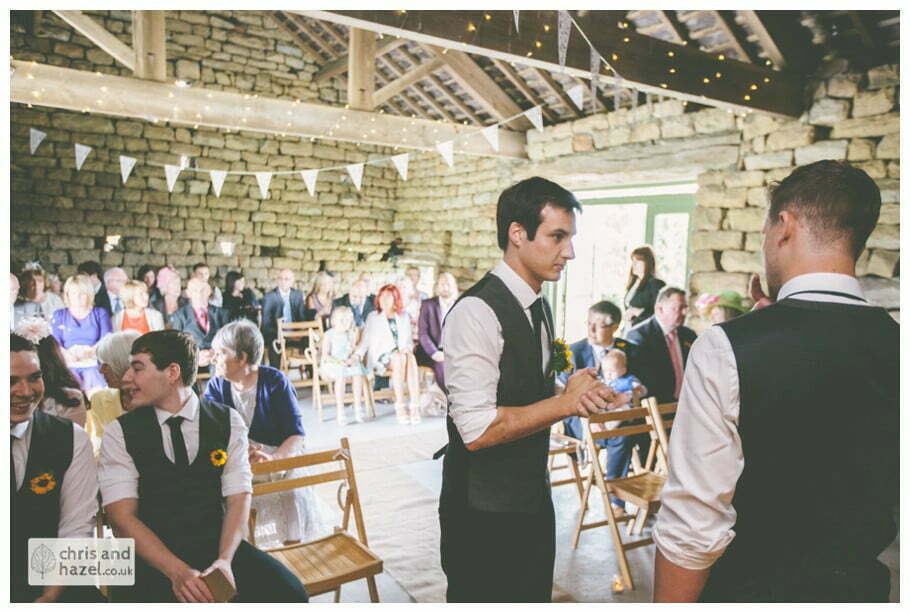 groom at altar humanist wedding ceremony in barn documentary Wedding Photographer Harrogate Wedding Photography Braisty Estate by Chris and Hazel Wedding Photography Jonny Dunn Stef Brown