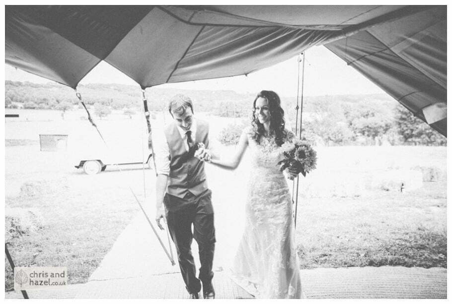 bride and groom entering wedding breakfast papkata tipi teepee rustic wedding theme hessian documentary Wedding Photographer Harrogate Wedding Photography Braisty Estate by Chris and Hazel Wedding Photography Jonny Dunn Stef Brown