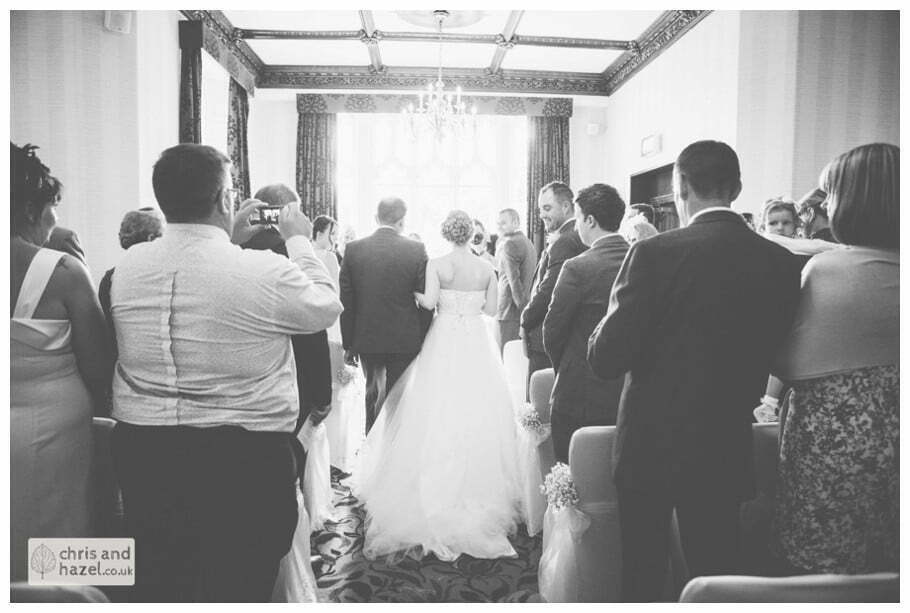 bride with father walking down aisle wedding ceremony kenwood hall documentary Sheffield Wedding Photographer Kenwood Hall Wedding Photography Sheffield by Chris and Hazel Wedding Photography Glen Briddock Emily Shaw