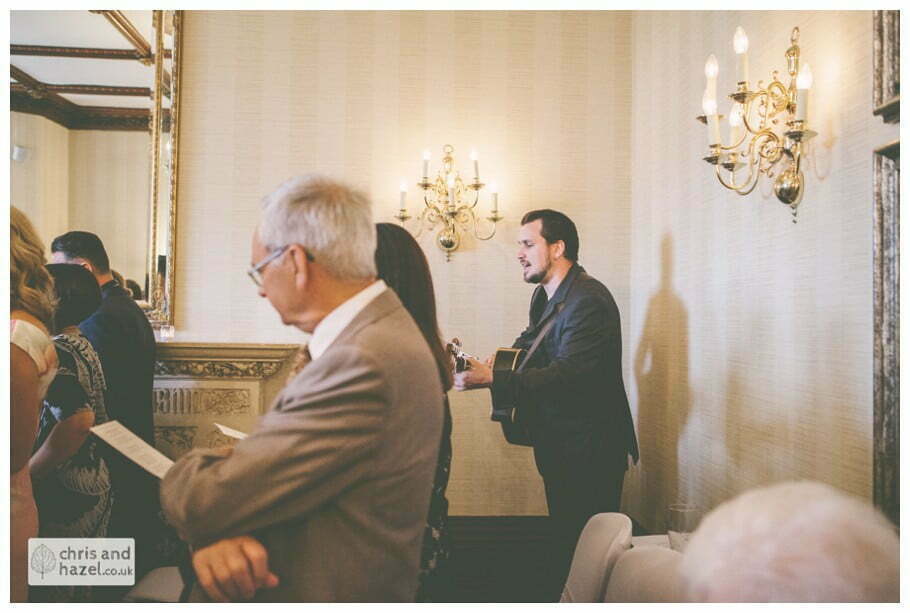scott hutch hutchinson singing during wedding ceremony kenwood hall documentary Sheffield Wedding Photographer Kenwood Hall Wedding Photography Sheffield by Chris and Hazel Wedding Photography Glen Briddock Emily Shaw