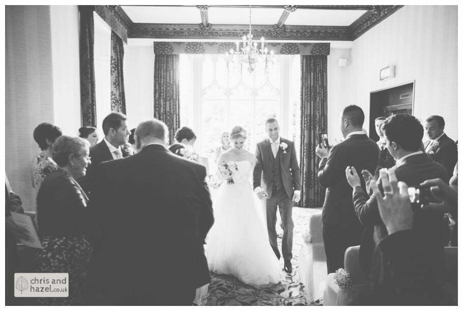 bride and groom walking up the aisle wedding ceremony kenwood hall documentary Sheffield Wedding Photographer Kenwood Hall Wedding Photography Sheffield by Chris and Hazel Wedding Photography Glen Briddock Emily Shaw