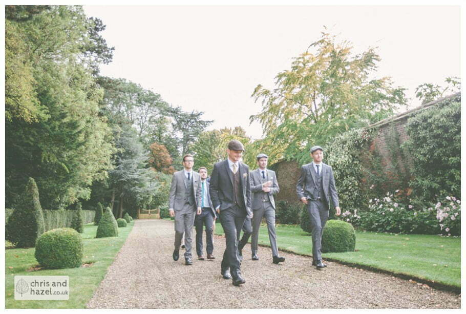 groom best man groomsmen ushers walking to venue documentary Hull Wedding Photographer Bishop Burton College Wedding Photography Hull by Chris and Hazel Wedding Photography Ross laurelin Matulis