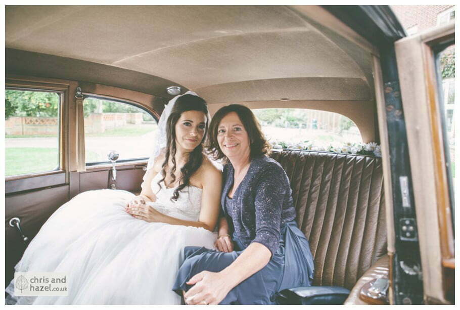 bride sat in wedding car with mother of bride documentary Hull Wedding Photographer Bishop Burton College Wedding Photography Hull by Chris and Hazel Wedding Photography Ross laurelin Matulis