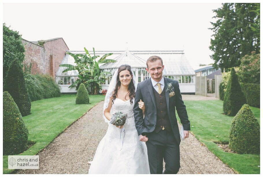 bride and groom portrait leaving ceremony documentary Hull Wedding Photographer Bishop Burton College Wedding Photography Hull by Chris and Hazel Wedding Photography Ross laurelin Matulis