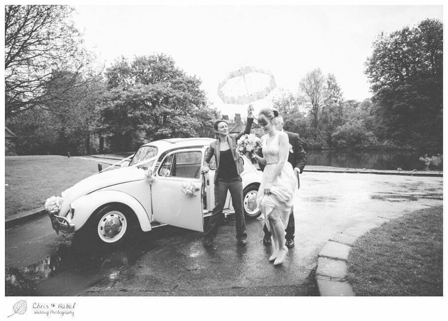 wet wedding, wedding umbrella, bride arriving, wedding car, vw beetle, volkswagen beetle wedding car, documentary wedding photography, Keighley ,Wedding Photographer, East Riddlesden Hall, Wedding Photography, Chris and Hazel Wedding Photography, Craig beasley, Stephanie Stubbs,