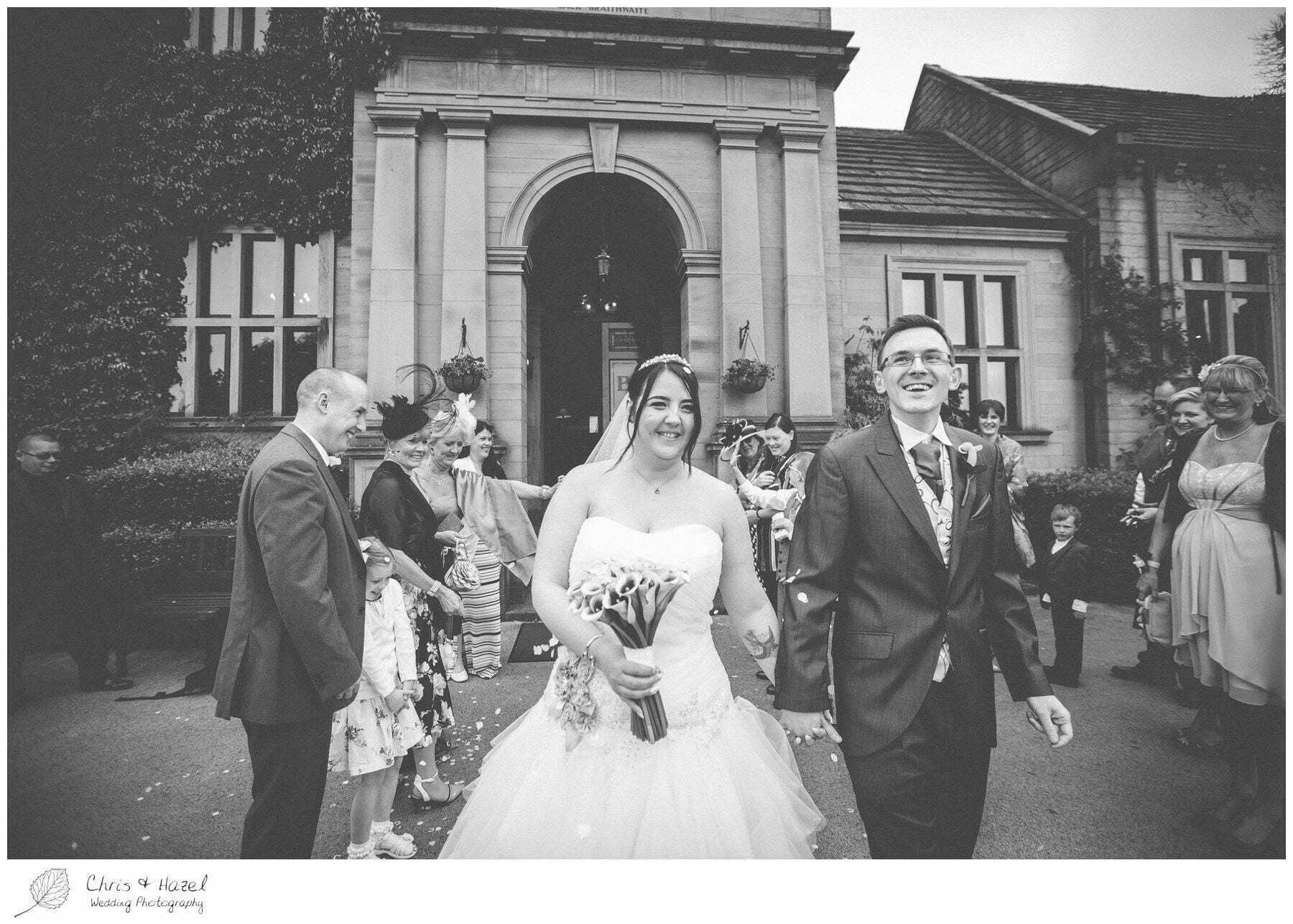 bride and groom confetti shot, confetti, bagden hall wedding venue, documentary wedding photography, denny dale, huddersfield, Wedding Photographer, Bagden Hall, Wedding Photography, Chris and Hazel Wedding Photography, Alex tomenson, Vicky hunt