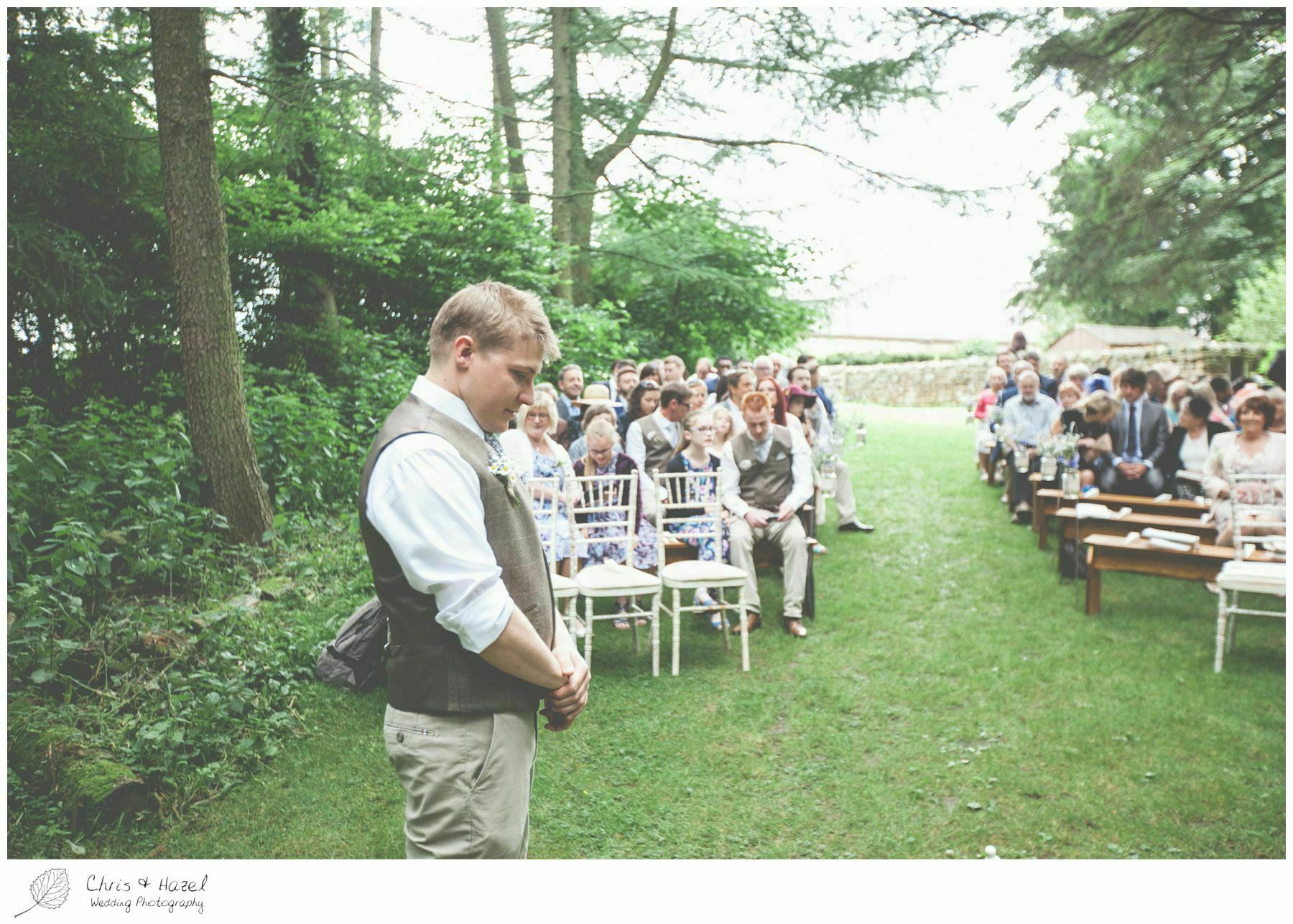 groom waiting for bride, woodland, forest, ceremony, outdoor, forest wedding, woodland wedding, eco wedding, love letters, wedding, Eccup Wedding Photographer, Lineham Farm, Wedding Photography Leeds, Chris and Hazel Wedding Photography, Richard Wyatt, Laura Kelly