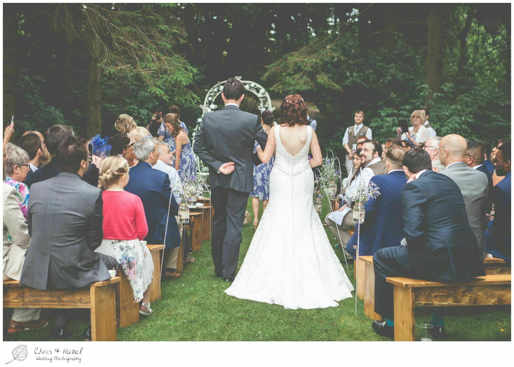 brrde walking down aisle woodland ceremony, woodland, forest, ceremony, outdoor, forest wedding, woodland wedding, eco wedding, love letters, wedding, Eccup Wedding Photographer, Lineham Farm, Wedding Photography Leeds, Chris and Hazel Wedding Photography, Richard Wyatt, Laura Kelly