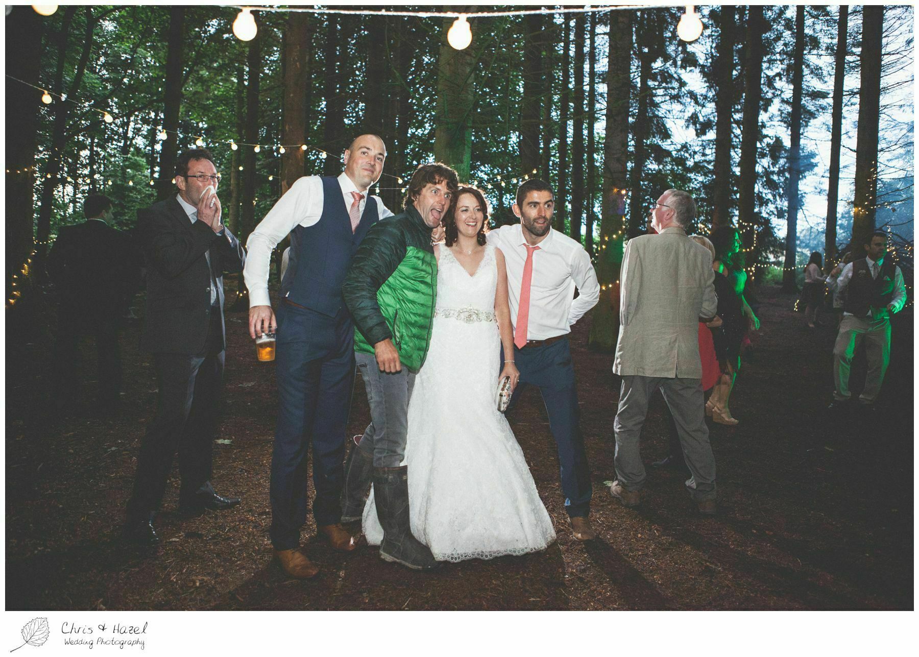 guests dancing, wedding woodland rave, outdoor evening wedding, forest wedding reception, woodland wedding evening reception, woodland wedding, eco wedding, wedding, Eccup Wedding Photographer, Lineham Farm, Wedding Photography Leeds, Chris and Hazel Wedding Photography, Richard Wyatt, Laura Kelly