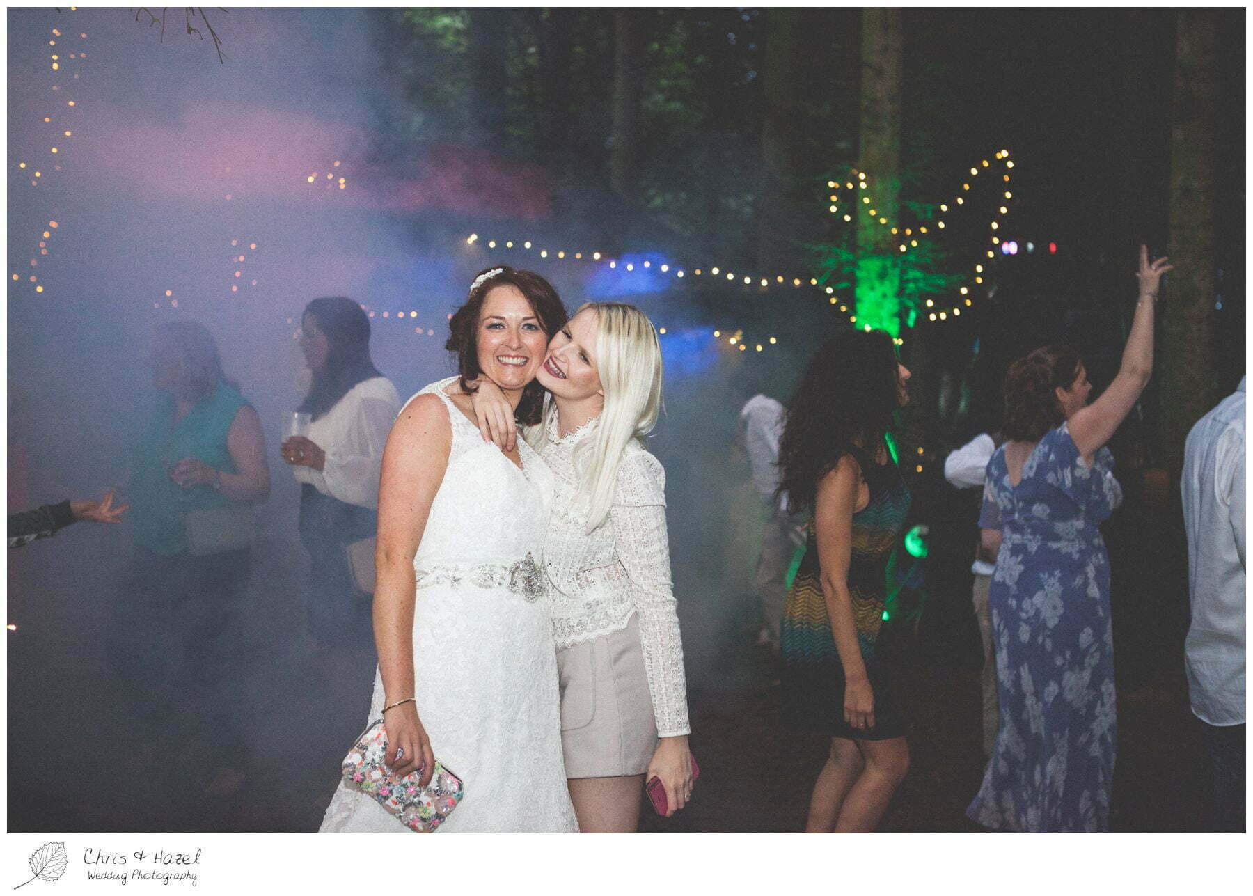 guests dancing, wedding woodland rave, outdoor evening wedding, forest wedding reception, woodland wedding evening reception, woodland wedding, eco wedding, wedding, Eccup Wedding Photographer, Lineham Farm, Wedding Photography Leeds, Chris and Hazel Wedding Photography, Richard Wyatt, Laura Kelly