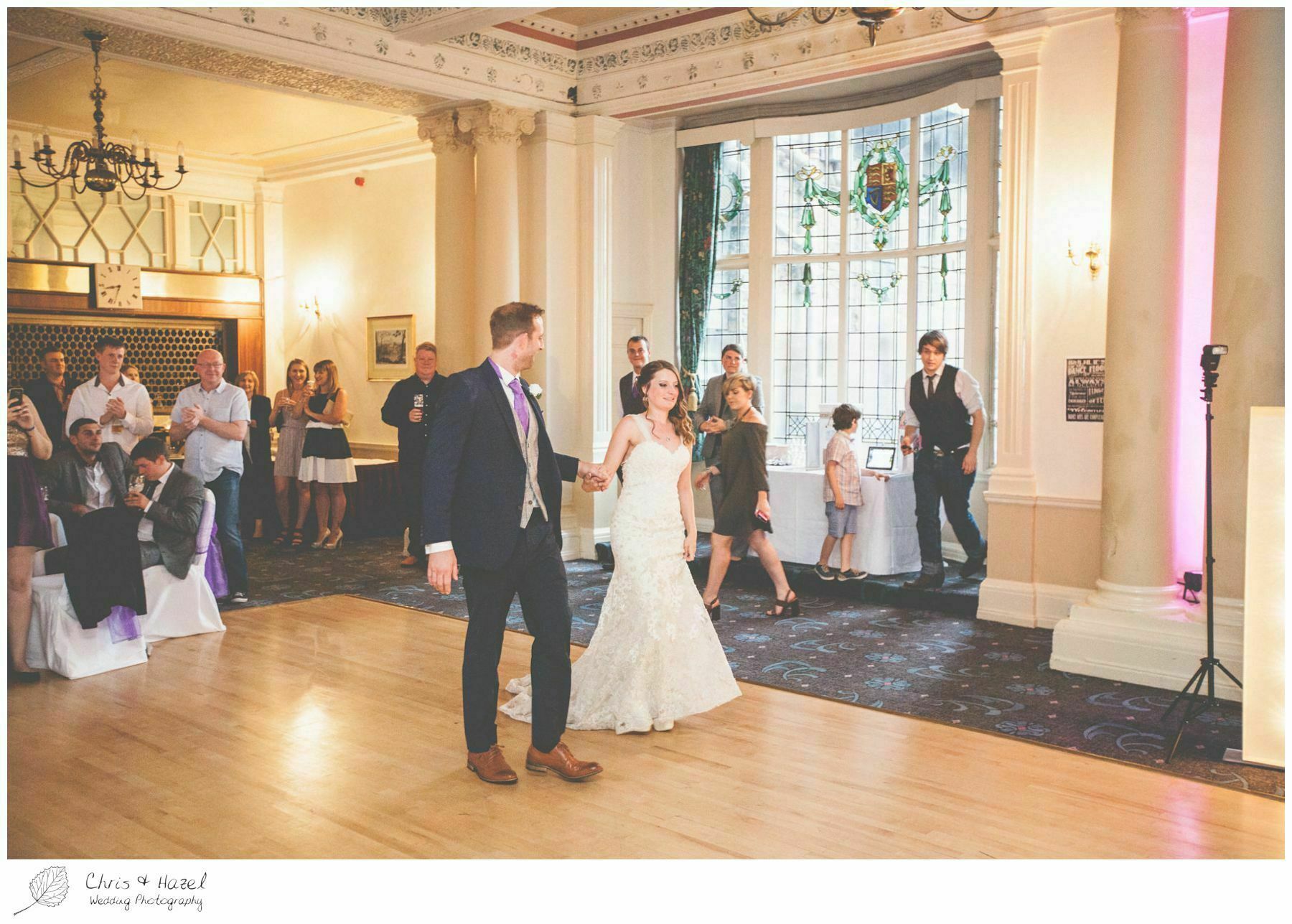 bride and groom entering for first dance, documentary wedding photography, the cairn hotel, the cairn hotel wedding photographer, wedding photography harrogate, wedding photography yorkshire, chris and hazel wedding photography, scott Dixon, caroline ellis, caroline Dixon