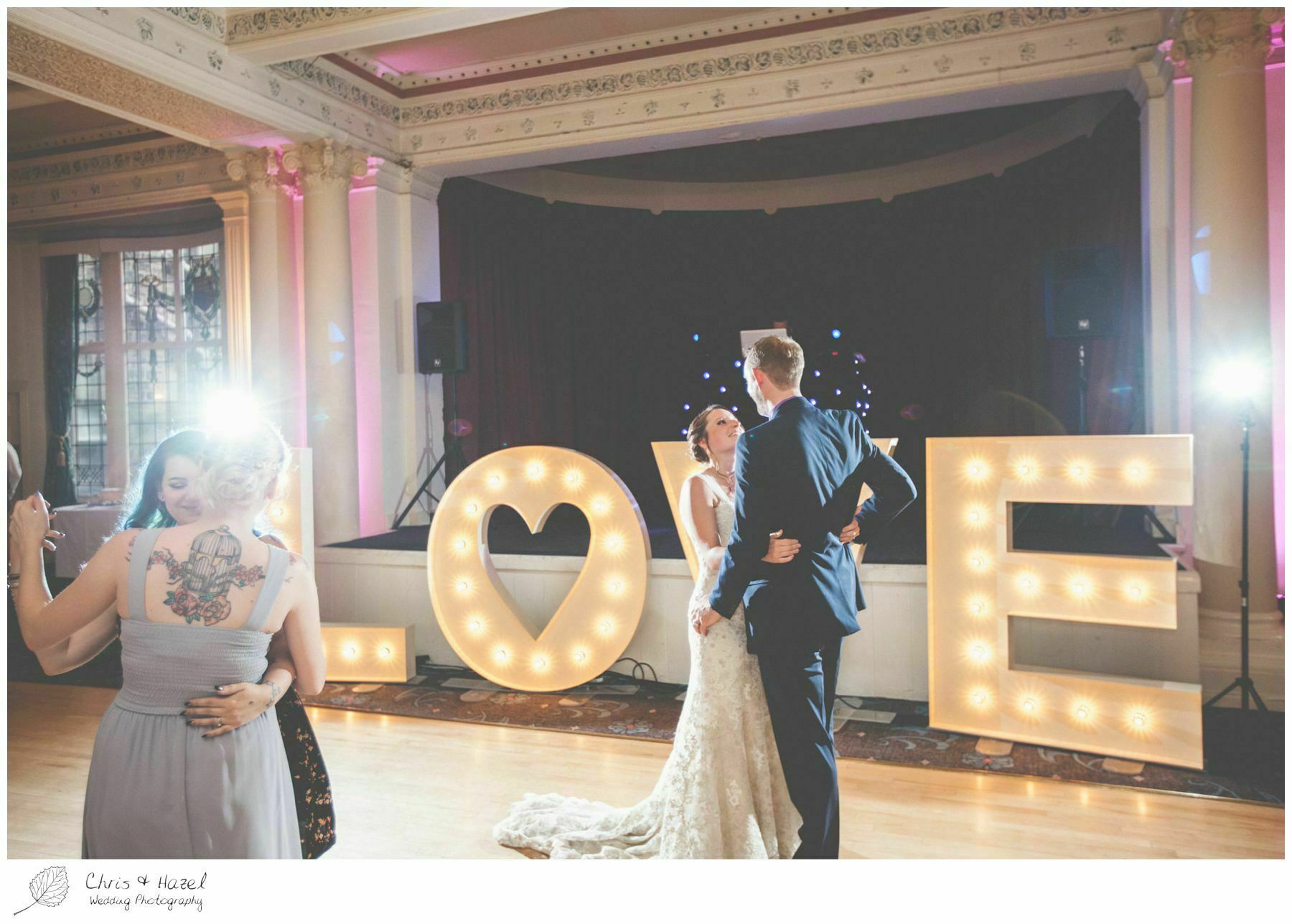 bride and groom first dance, bride and groom with love letters, wedding big love letters, light up love letters, documentary wedding photography, the cairn hotel, the cairn hotel wedding photographer, wedding photography harrogate, wedding photography yorkshire, chris and hazel wedding photography, scott Dixon, caroline ellis, caroline Dixon