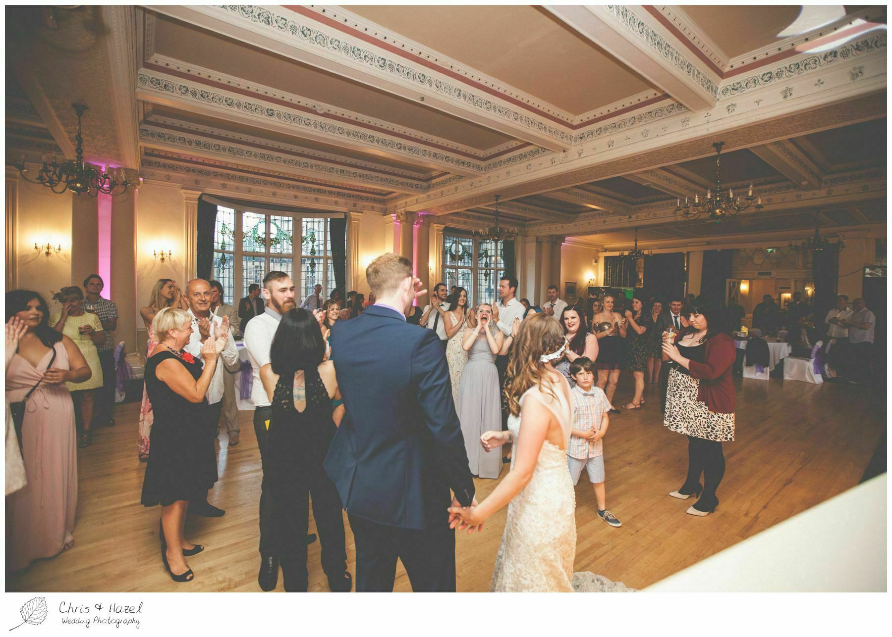 bride and groom dancing with wedding guests, wedding guests dancing, documentary wedding photography, the cairn hotel, the cairn hotel wedding photographer, wedding photography harrogate, wedding photography yorkshire, chris and hazel wedding photography, scott Dixon, caroline ellis, caroline Dixon