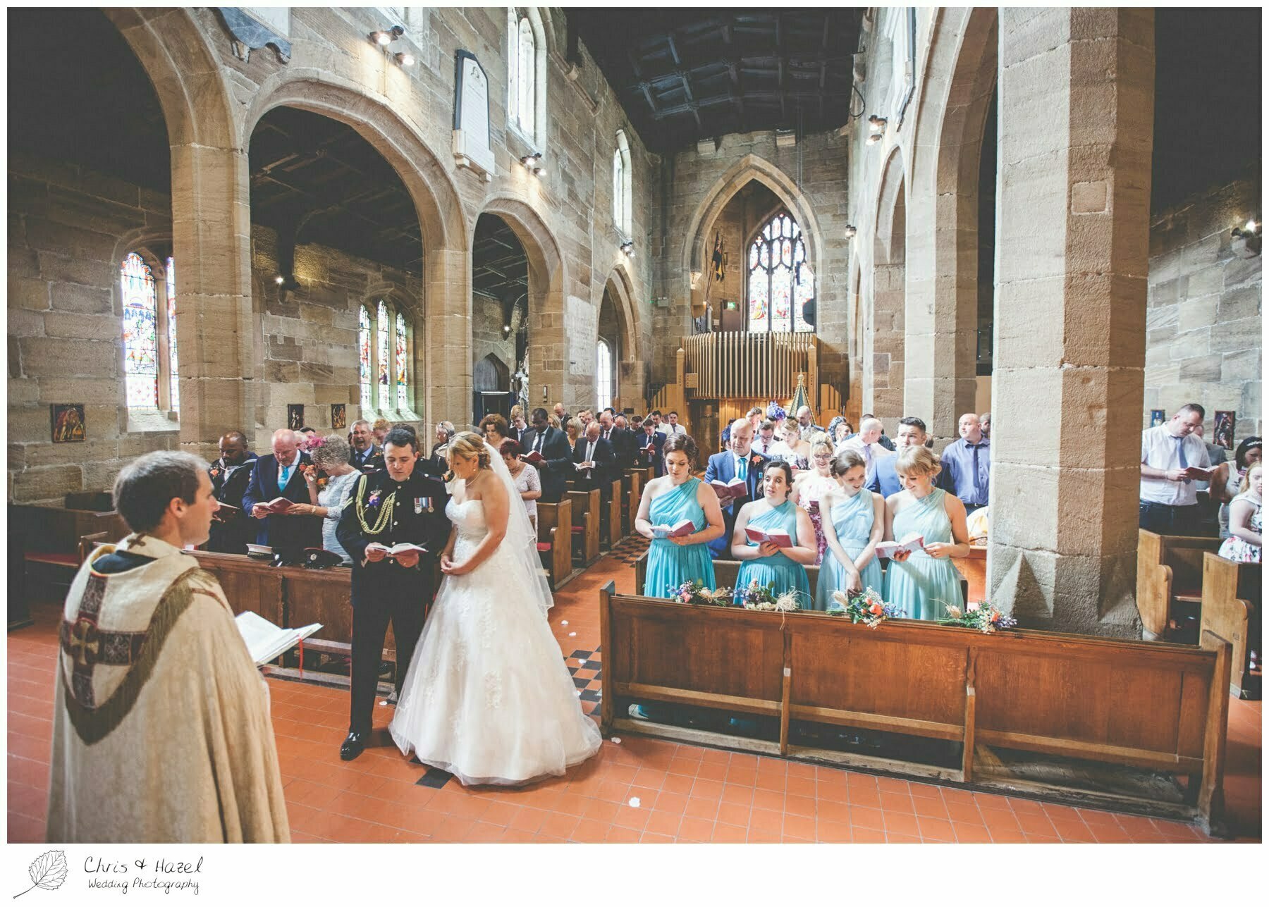 bride and groom at altar, wedding ceremony, st john the baptist church, royston st john the baptist church, Barnsley wedding photographer, barnsley wedding photography, burntwood court hotel wedding photography, west Yorkshire wedding photography, chris and hazel wedding photography, simon Devonport, Rebecca silcock, Rebecca Devonport,