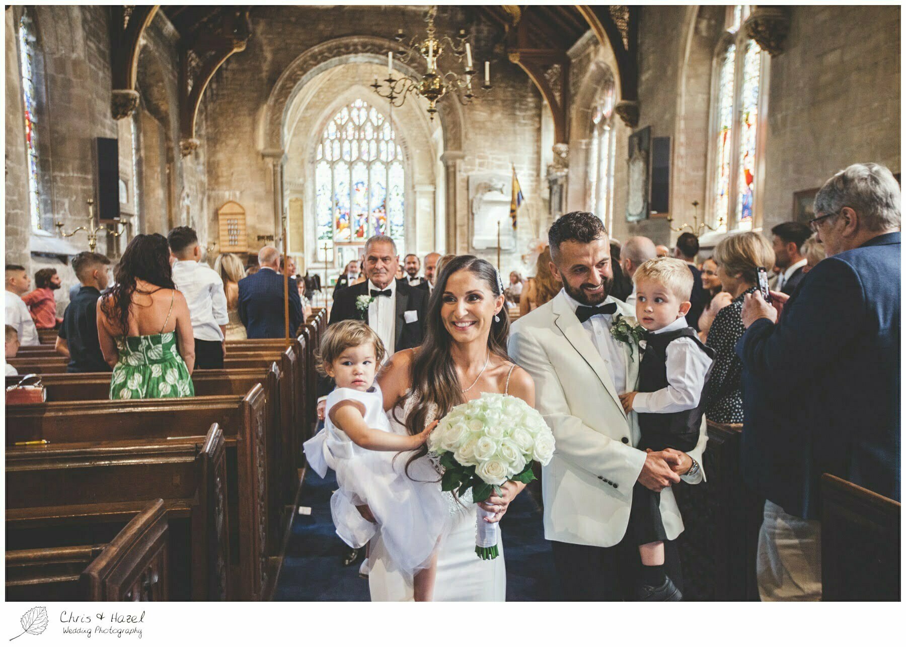Bride and groom walking up the aisle, St Marys church Bitton, St Marys church wedding day, Bath Wedding Photographer, Documentary wedding photography Bath, Bath Wedding Day, Bitton Wedding Photographer,